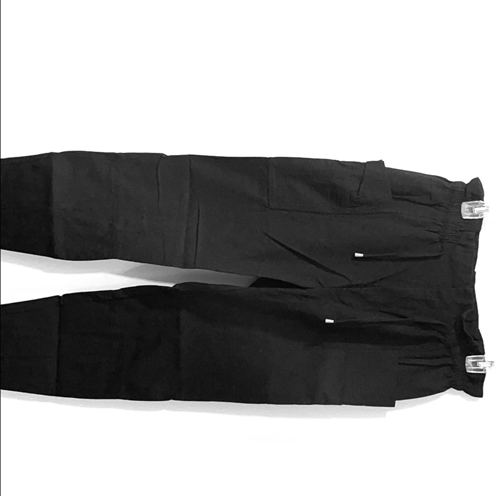 A piece apart trash bag pants